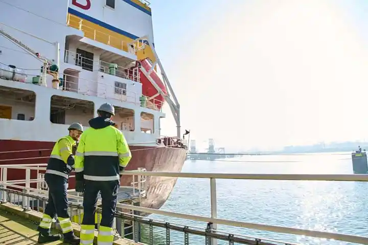 OCI workers with vessel